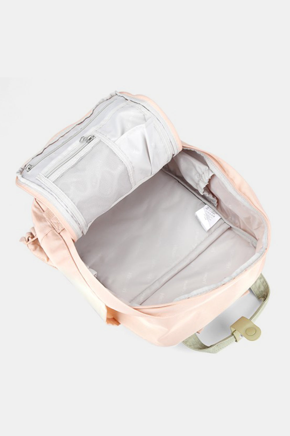 Interior view of the Himawari backpack, featuring a spacious compartment with zippered pockets for organized storage.