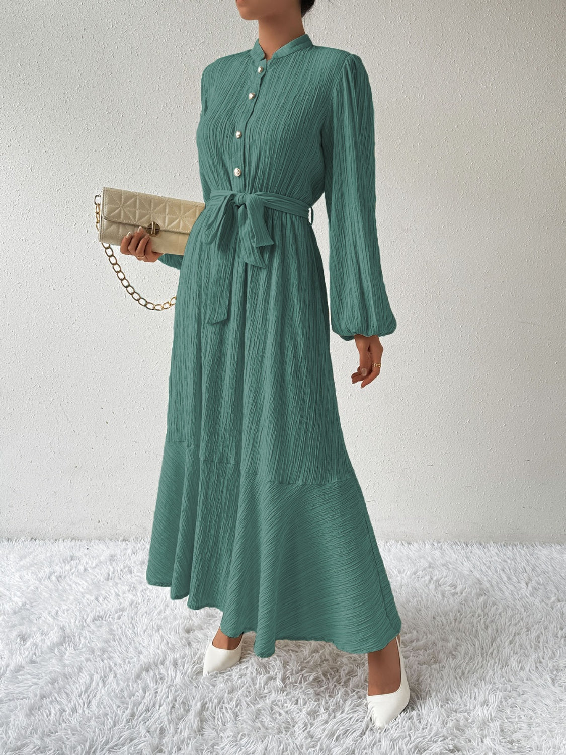 Honey Tie Waist Long Sleeve Dress in green with button front and flowing maxi design. Features a tie waist and long sleeves, perfect for versatile fashion.