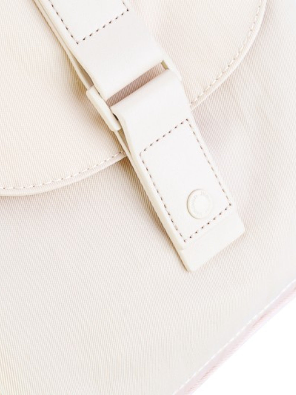 Close-up of the Himawari backpack's front buckle detail, showcasing its durable and stylish design for secure closure.