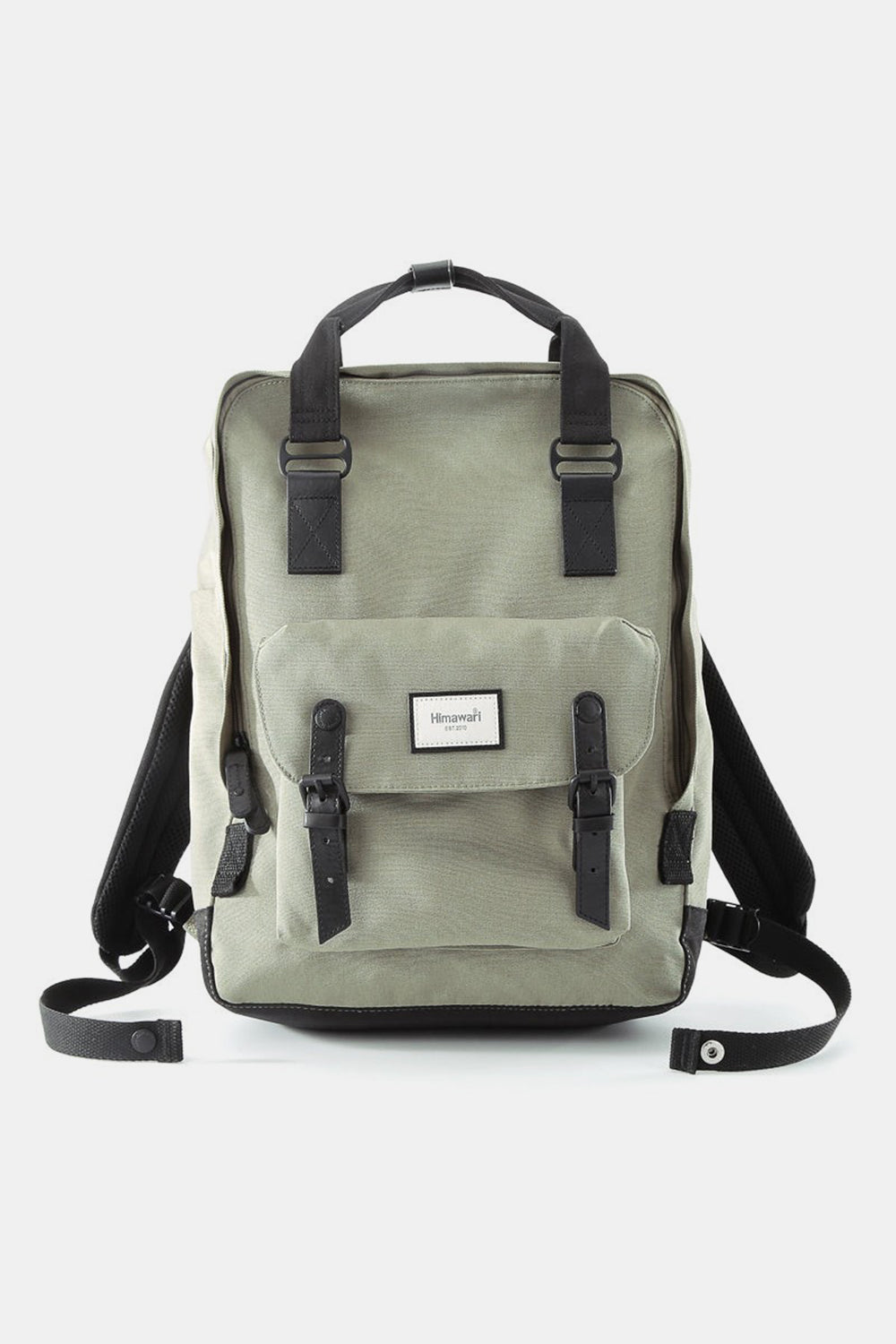 Himawari canvas backpack in sage green with black straps and a front pocket, combining style and waterproof functionality.